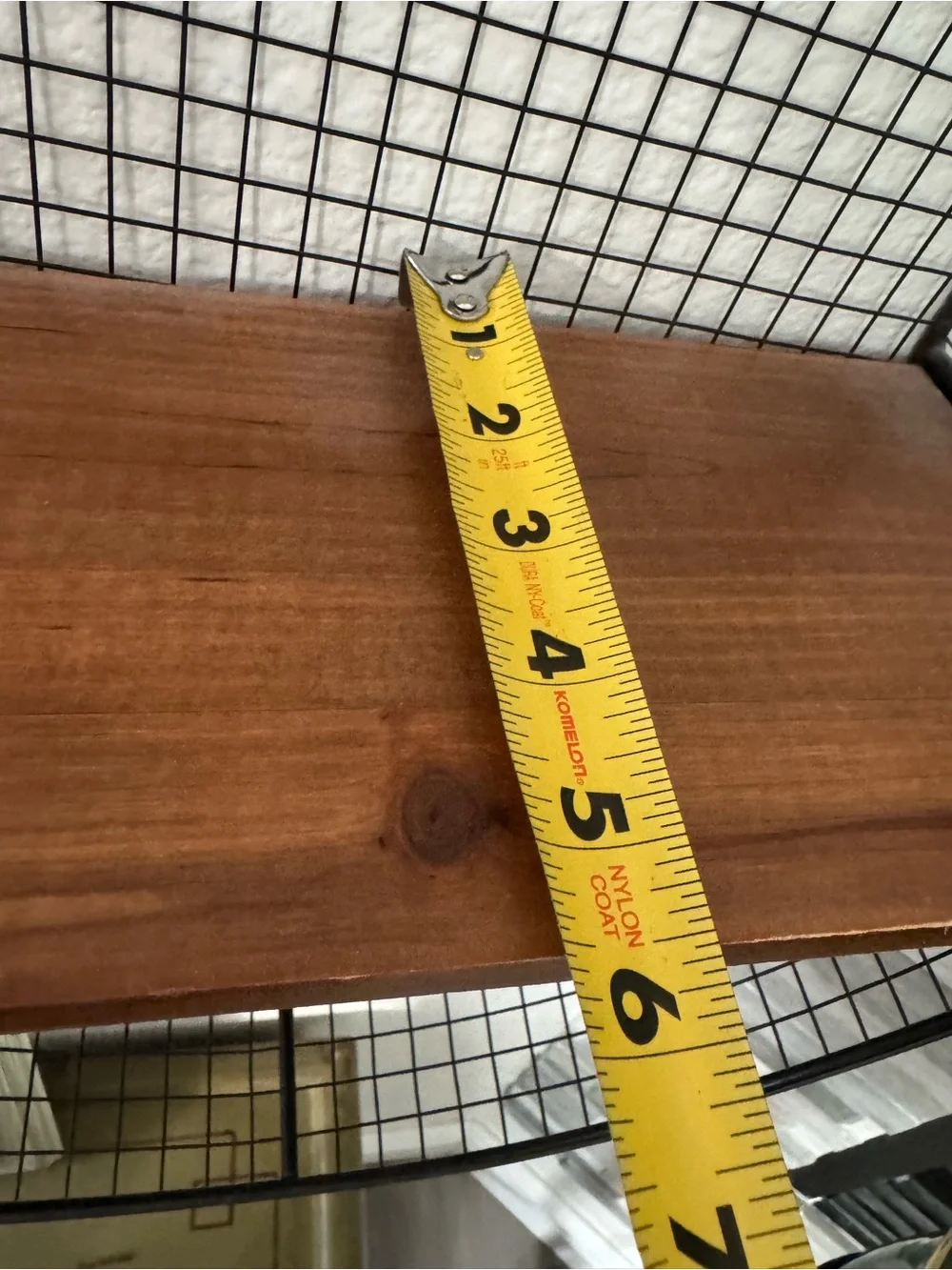 Black Wire Oval Wall Shelf with Brown Wood Accent